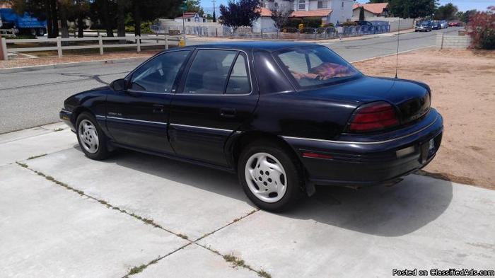 1995 Black Pontiac GRAND-AM (SE)
