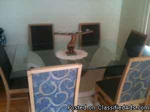 Large glass top dining table with 6 chairs - Price: 500