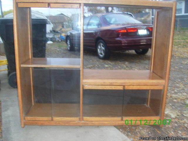 real nice sturdy entertainment center for sale $20.00 holds up to a 32 in. t.v. - Price: $20.00