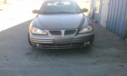 02' Gold Pontiac Grand Am SE Priced to sell at $3,200.00 OBO. Good tires, runs great, A/C works excellent and fog lights. Lein sale "SOLD AS IS" Come by and see this vehicle at 12416 Yosemite Blvd. Waterford, Ca. 95386 or Call Brenda today before this car