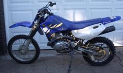 2003 Yamaha TTR 125 LE. Good Condition, Blue Book, $1135.00. Electric and kick start. New battery, new rear tire, almost new o-ring chain, new choke cable. Runs great, body panels in fair condition. Great starter bike. Rear wheel 13", front wheel 15".