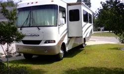 '05 32' Four Winds Hurricane 32R, W/ '07 Roadmaster two wheel tow dolly. Ford Triton V-10 gasoline, Excellent Condition; no smoking/no pets; lots of storage w/pass thru; two slide-outs w/awnings; bedroom; Dining/Living Room; Sofa/Pullout bed; Queen bed