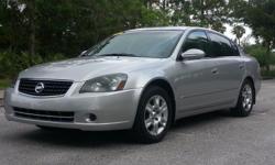 2005 Nissan Altima 2.5 S with only 114,000 mostly highway miles. This Silver car is in excellent condition and you can tell she's been very well taken care of. The body has hardly any noticeable scratches and no dents, very clean and sporty look.