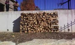 100% seasoned split oak firewood sold delivered and stacked. 1/2 cord for $150 (Pictures show a 1/2 cord delivered and stacked). Buy a cord for $250 delivered and stacked (A cord is 2 of the pictures). 816-277-7193.