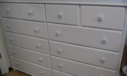 White painted 12 drawer chest. 8 large drawers - 4 smaller drawers. 62 1/2 long -17 1/4 deep - 42 1/2 high. Great for a child's or children's room, playroom (drawers are very spacious) or craft room.
