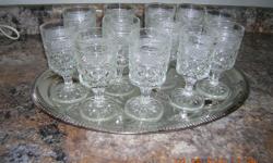 12 matching heavy Crystal Wine Glasses .
Real nice Pattern , no Chips !