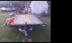 I have a 14 ft double axle equipment trailer. The trailer is in overall good shape and the wood floor is in great condition. It has ramps on the back and slots down the side for securing your load or post for sides.&nbsp;I'm asking 2500 but may consider a