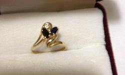 14k Solid Yellow Gold Custom Ring With Sapphire & Diamonds Elegant Women
Size:4.25
2 Genuine Natural Sapphire (2.25mm by 4.5 mm&nbsp; each) Top Grade
Condition: Great
Weight; 1.6grams
Stamped 14k and SJ
SJ mens Schmitt jeweler who makes custom jewelry
For