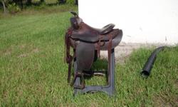 THIS IS A 16 INCH WESTERN SADDLE IN VERY GOOD SHAPE, IT IS NOT A SOUTH OF THE BORDER SADDLE IT WAS MAKE IN THE USA. PLEASE CALL 615 423 2858