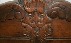 1800's potty chair good condition, with lion head carved on top and bottom..