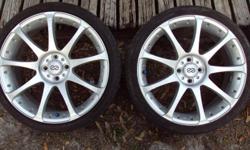 nice 18 " rims,will fit any 4 lug with 14" 15" factory rims,such as corolla,civic,lancer,mazda,ex. have 8 mm spacers if needed.great shape. have some scuffs from normal use.1200.00 new. has tires on rims that hold air,2 of them are very good,other 2 is