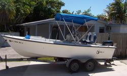 18' SEAHAWK, EVINRUDE 88 SPEC, W/TRAILER.&nbsp; RUNS GREAT, EQUIPPED, NAPLES, FL
On trailer, ready for the Gulf or backwater
Always under roof when not in use
18' SeaHawk&nbsp;(1987), Center Console, Rated 150 hp
40&nbsp;gal under floor fuel tank, leaks,