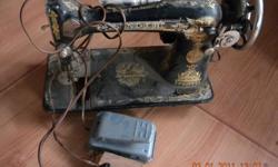 1928 Singer Sewing Machine
Model #127, Serial #AC202265
Needs some TLC. Came from distant relative
Can be put to a table or to a box. Has foot pedal and light.
Has egyptian artwork on it.