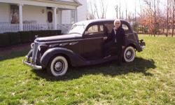 The mileage on the car-very low-was advertised as "believed to be original" when I purchased the car. It has the factory 3 speed with overdrive and free wheeling transmission. I had a new clutch installed summer of 15. The windshield cranks out, but is