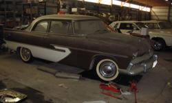 1956 Plymouth Belvedere, Very Little rust as this car is originally from Texas. 2 Door sedan with a V-8 and powerflite trans, Brown/white Sportone 2 tone paint. New correct Goodwich Silvertown wide white tires on restored original wheels. New Interior.