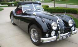&nbsp;
1957 Jaguar XK140 MC Roadster black with red interior. Matching number car. This is an absolutely beautiful older restoration.
&nbsp;