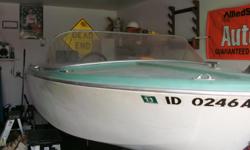 1961 16ft Bellboy Classic boat and Trailer with a 40hp Evinrude motor. Also has a trolling motor. Nice shape..Call -- or cell phone --..Tim or Debbie
