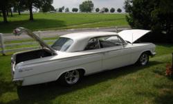 1962 Chevy Impala Super Sport
Numbers Matching
White 2 Door Hard Top Super Sport Impala
Black Interior
Automatic on Collum
Bucket Seats
Console glove Box
327 Cubic inch motor
360 Horsepower, new rebuild
Tranny 700 R4
Tork thrus II polished aluiminum