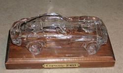 Very nice glass model of a 1963 split window corvette on wood stand.