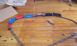 moving and found my old Lionel train set great condition, has bobbing giraffe asking 300 dollars cash