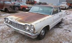 1964 Chevrolet Bel Air 2 Door Great project car. This car had the left quarter panel damaged in 1975 and the car was parked with 66,000 actual miles. It has a 6 cylinder motor and a 3 speed transmission. I have not tried to turn the motor over. There is