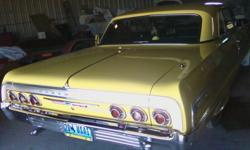 64 Chevy Classic Impala, not totally orginal,2dr hardtop very good condition 454 engine,w/ BM 400 tranny (automatic)&nbsp;has 308 readend had 411 gears for it has been gargared for the last 20 year, real fast fun car. Clear title, mostly chrome under