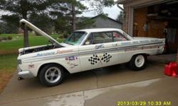 1964 Mercury COMET B/FX ~~~"A Old race car"
Rust free .. AZ car.
331 V8 with 5 speed also 5:13 rear end 9" ford
Roller engine
Just had it rewired, Has NEW 2X4's on it now
Bostrom Bucket seats , With "S/S Springs" Frt & Rear,
Fiberglass Bumpers and Hood