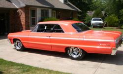 1964 SS Impala Restored. the car is a true SS...this car has absolutley no rust.it was taken apart and painted.it has a350 chevy engine with 20,000 miles and a power glide automatic console floor shift. new interior, new headliner ,new exhaust all