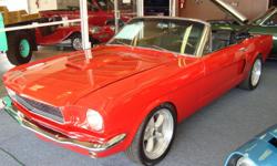 1965 Ford Mustang Show Car
Suspension:
Rod & Custom Mustang II front suspension with adjustable coil over shocks
Mustang II front power rack and pinion
Four wheel disk brakes with stainless steel brake lines
Ford 9? rear with Explorer disk brakes
KYB