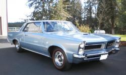 1965 PONTIAC GTO THAT HAS HAD THE SAME OWNER FOR 33 YEARS YES IS IT A REAL GTO AND A REAL TRI POWER 4 SPEED CAR.
THE PAINT STILL LOOK GREAT THE INTERIOR LOOKS GREAT TO THE CHROME AND STAINLESS ARE VERY NICE THE CAR RUN'S AND DRIVE'S OUT EXCELLENT