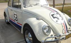 1965 VW Beetle:Herbie the Love Bug: Runs and drives great.Rebuilt engine(1200 cc),new carburetor,new clutch,new headliner,16" Eagle Goodyear Nascar tires. This car was used by Disney as a "promo" car. The steering wheel and headlights are from one of the