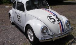 1966 VW BEETLE ( BUG)&nbsp; "HERBIE THE LUV BUG" ; ENGINE JUST REBUILT WITH LOTS OF CHROME; BODY AND INTERIOR GOOD SHAPE. RUNS AND SOUNDS GREAT; MISSOURI CAR - NO RST; MAG WHEELS. ASKING $12,500 OR BEST OFFER