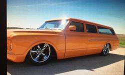 Please contact me at : pamazzillo@disciples.com . 1967 Chevy Suburban Custom Built The body started as a rust free body and built to impress. Chopped 41/2 inches in the front and 6 inches in the rear giving a 1 of a kind look. The front doors were built