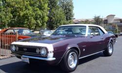 There is nothing like a classic SS Camaro. This Royal Plum beauty was built in Van Nuys. It is equipped with a numbers matching 350, TH350 transmission, power steering, power front disc brakes, aluminum radiator, Deluxe interior, A/C, bucket seats, center