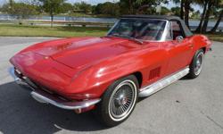 This is an absolutely gorgeous, numbers matching 1967 Chevy Corvette "Stingray" Roadster&nbsp;that has been completely restored. This beautiful Rally Red convertible comes equipped&nbsp;with 4 speed manual transmission, original numbers matching 327/300
