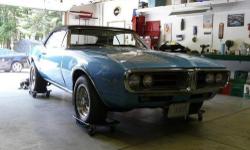 1967 Pontiac Firebird, very clean,runs great, convertible top almost new,seats almost new,everything works,professionally appraised in 08 @ 32-35 thou.,also have original Pontiac rims and tires. Engine is a 400 C.I American. 2 speed trans., Stored in a