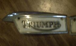 I have a right and a left side emblems for a 1968 Triumph motorcycle. 300.00 call Rick at 517-918-1075