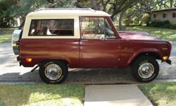 1969 Ford Bronco two door/removable top/color white over maroon, 302 V-8 engine, runs perfect, burns no oil, 14 mpg, factory A/C. Actual mileage 63,164 original miles (95% highway). 4 x 4 lock-out hubs/3 speed manual transmissiion, skid plates, new