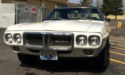 Very desirable and hard to find 1969 Pontiac Firebird. One year body style that is going up in value. Great running 350 V-8, Automatic Transmission, Power Steering, Brake Booster, Bucket Seats, Nice Chrome, Glass is in good condition, New Vinyl Top.