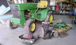 garden tractor good condition engine out and needs rebuilt.complete