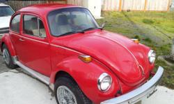 For sale is a 1974 Volkswagen Super Beetle with factory sunroof. Runs good, just had front end work done and installed new cables for sunroof. The body is straight, some rust by rear window. Needs headliner and better seats. It is a great car to put back