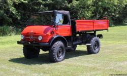 1977 416 Cabriolet Unimog This low hour (932), low km.(17k) 416 Unimog was just stripped to bare metal and has been resprayed in Viper Red. The chassis, motor, bottom of cab, and the inside got a fresh coat of paint as well. Wheels and bed sides were