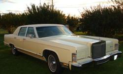 $3500 78 LINCOLN CONTINENTAL-TOWN CAR...CONTINENTAL ON LIGHT COVER AND TOWN CAR ON THE SIDE BEHIND FRONT TIRES. 85,000 ORIGINAL MILES, RUNS EXCELLENT, TRANSMISSION TIGHT AND SHIFTS IMMACULATE. 460 MOTOR, NO LEAKS. ORIGINAL VINYL TOP IN GREAT CONDITION,