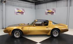 Stk#025 1979 Pontiac Trans Am
Painted Gold BC/CC paint with a new hood Bird and side top bird, new Trans Am decals, Factory T-Top, new Honey Rims, and BF Goodrich Radial T/A white letter tires. There are four wheel power disc brakes, new rubber and felt,