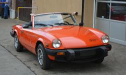 This 1980 Triumph Spitfire 1600 Convertible is a beautiful and extremely low mileage example with just 14k original miles. Orange with black interior. An extremely clean and solid car that drives excellent. Original owners manual, tonneau&nbsp;cover, and