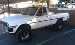 I have a 1984 Mitsubishi SP4x4 Pick up truck
2.6 Liter 4 cyl. Original 96,XXX miles -- same engine as the "rare" Mazda B2600
5 speed manual transmission (with 4x4 working)
motor and transmission are in excellent shape.
NO Leaks!!! LOTS OF POWER!!!!
Long