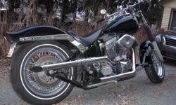 This is your chance to own a 1987 Softail Custom that was restored and modified recently. The bike was stripped down to the frame so that it could receive a fresh layer of powder coat, and the sheet metal could be repainted. While this was all being done