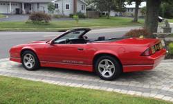 1998 Chevrolet Camaro Iroc Z Convertible, stunning red with grey interior,this car runs and drives like new,factory 305 V8 with the tuned port injection and yes the air conditioning blows ice cold,interior is all original and in great condition.