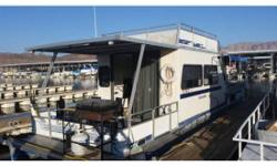 1989 Landau Boat Co Pontoon,This boat is a ton of fun, its a Landau 1989 Pontoon house boat at callville lake mead. It's 40' x 10' with a rooftop balcony a/c unit, generator, sleeps 4, full furnished, 2-75 gal gas tanks, 30 gal sewer tank and 75 gal