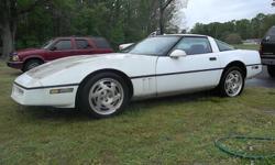 nice corvette in need of a little tlc, auto, low miles 80's, and run's great, but does need tire's